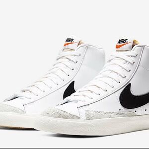 Nike White and Black High-Top Sneakers.